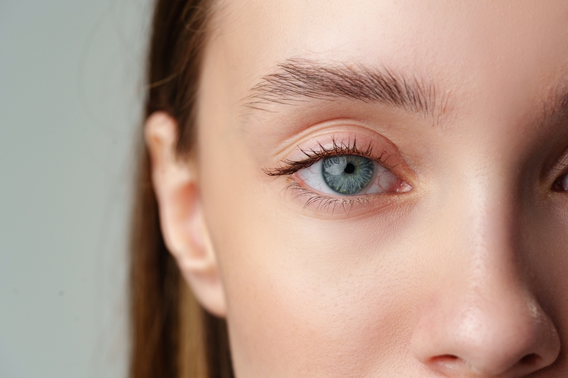 woman blue eye closeup